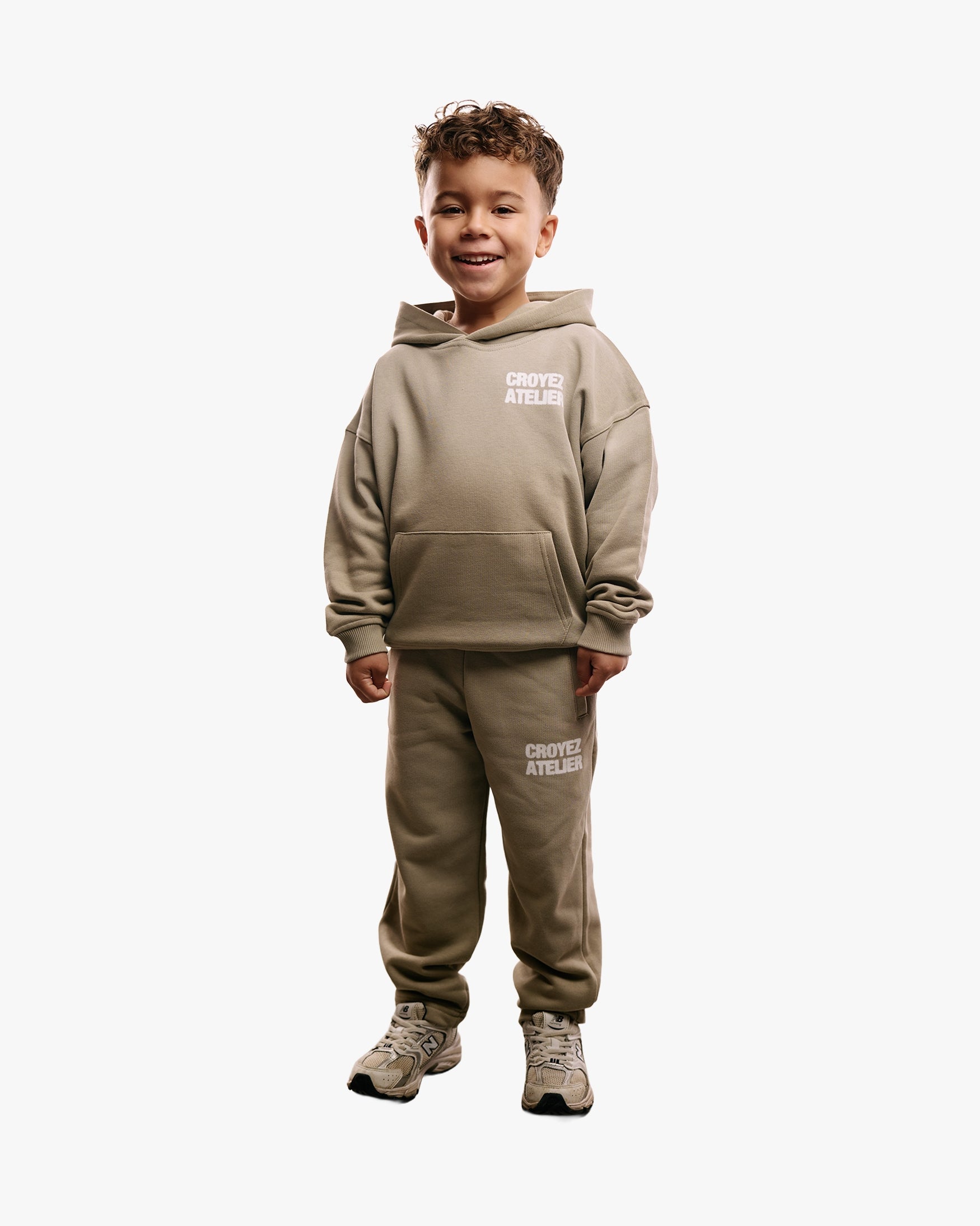 CROYEZ_MINI_SPRAYED_ATELIER_HOODIE_DUSTY_OLIVE_FRONT_4bac41e5-3999-4ed2-92a6-4d1f88d94a43.jpg